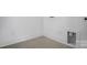 Utility room featuring tile flooring, modern trim, and a hookup for a dryer at 3054 Constitution Ln, Gastonia, NC 28056