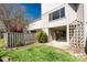 Property backyard with patio, fenced yard, mature landscaping and grassy lawn at 3709 Willow Point Dr, Charlotte, NC 28277