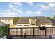 Exterior shows neighboring houses with attached garages and shared backyard space at 3718 Speer Blvd, Charlotte, NC 28217