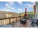 Outdoor patio area with seating, grill, and views of the surrounding neighborhood at 3718 Speer Blvd, Charlotte, NC 28217