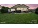Spacious backyard featuring a patio, grill, and ample seating for outdoor entertainment at 423 Granite Lake Ct, Denver, NC 28037