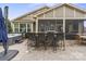 Backyard patio with built-in grill, bar seating and hot tub are ideal for entertaining and relaxation at 423 Granite Lake Ct, Denver, NC 28037