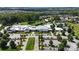 Aerial view of the community center with a pool, clubhouse, and parking at 423 Granite Lake Ct, Denver, NC 28037