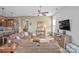 Comfortable living room featuring plush sofas, stylish decor, and plenty of natural light at 423 Granite Lake Ct, Denver, NC 28037