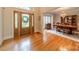 Spacious entryway features hardwood floors, decorative glass door, and access to the formal dining room at 4646 Eagle Pointe Ct, Denver, NC 28037