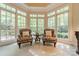 Bright sitting area with large windows overlooking the landscape at 4646 Eagle Pointe Ct, Denver, NC 28037