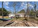 Backyard featuring a trampoline, hammock, fenced yard, and mature trees at 4793 Appaloosa Ln, Maiden, NC 28650