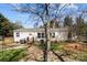 Exterior back view of a home with a grill on a small deck at 4793 Appaloosa Ln, Maiden, NC 28650