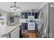 Well-lit kitchen features stainless steel appliances, ample counter space, and modern lighting at 4793 Appaloosa Ln, Maiden, NC 28650