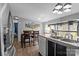 Open-concept kitchen with stainless steel refrigerator and an inviting dining area at 4793 Appaloosa Ln, Maiden, NC 28650