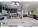 Stylish kitchen with modern sink, countertops, and view to the living spaces at 4793 Appaloosa Ln, Maiden, NC 28650