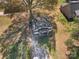 An aerial view of home featuring mature trees and long driveway at 501 S Inman Ave, Bessemer City, NC 28016