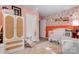 Charming Bedroom features soft lighting, crib, and a decorative floral accent wall at 501 S Inman Ave, Bessemer City, NC 28016