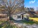 Charming home with a front porch, mature trees, and well-maintained grounds at 501 S Inman Ave, Bessemer City, NC 28016