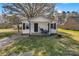 Charming one-story home with black shutters, covered porch, and green lawn at 501 S Inman Ave, Bessemer City, NC 28016