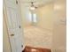 Expansive bedroom with neutral carpet, a ceiling fan, and a large window for natural light at 5016 Haybridge Rd, Charlotte, NC 28269