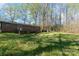 Exterior view of the backyard with mature trees at 518 W Westview St, Gastonia, NC 28052