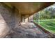 Attached brick carport features a solid roof, and a versatile space for parking and easy access to the house at 518 W Westview St, Gastonia, NC 28052