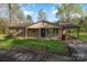 Charming single-story brick home with a covered front porch, attached carport, and a cozy, inviting atmosphere at 518 W Westview St, Gastonia, NC 28052