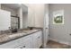 Bathroom with granite counters and double vanity at 7015 Jerimoth Dr, Charlotte, NC 28215