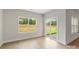 Living area with sliding glass doors and views of the backyard at 7015 Jerimoth Dr, Charlotte, NC 28215