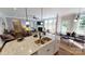 Spacious kitchen with granite countertops, a double sink, stainless steel appliances, and an open view to the living room at 7016 Butternut Oak Ter, Huntersville, NC 28214