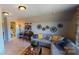 Cozy room with seating, accent wall, and view to bathroom at 7016 Butternut Oak Ter, Huntersville, NC 28214