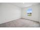 Cozy carpeted bedroom with ample natural light and a relaxing atmosphere at 706 Olde England Dr, Lincolnton, NC 28092