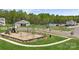Community playground including swings and slides, located across the street from the community pool at 706 Olde England Dr, Lincolnton, NC 28092