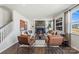 Spacious living room with a modern fireplace and large windows at 711 Olde England Dr, Lincolnton, NC 28092