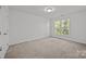 Bedroom with a double window allowing an abundance of natural light into the space at 7262 April Mist Trl, Huntersville, NC 28078