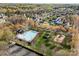 Aerial view of community pool, green spaces, and playground, offering recreational amenities at 7262 April Mist Trl, Huntersville, NC 28078
