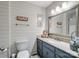 Stylish bathroom with shiplap walls and modern vanity at 7624 Cedarbrook Dr, Charlotte, NC 28215