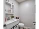 Bathroom featuring a white vanity with ample counter space at 7624 Cedarbrook Dr, Charlotte, NC 28215
