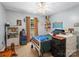 Cozy bedroom featuring playful decor and ample storage space at 7624 Cedarbrook Dr, Charlotte, NC 28215