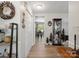 Hallway with sleek floors and neutral walls offers a seamless transition between living spaces at 7624 Cedarbrook Dr, Charlotte, NC 28215