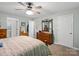 Cozy bedroom featuring a large dresser and neutral tones at 7624 Cedarbrook Dr, Charlotte, NC 28215