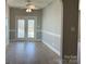 Dining area with wood floors, French doors, and ample natural light at 906 Wisteria Way, Salisbury, NC 28146