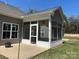 Screened in patio with a ceiling fan and outdoor access at 906 Wisteria Way, Salisbury, NC 28146
