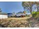 Large backyard with mature trees at 100 W 3Rd St, Cherryville, NC 28021