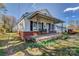 Charming one-story home, with brick accents and a welcoming front porch at 100 W 3Rd St, Cherryville, NC 28021