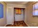 Small pantry with access to the closet provides extra storage space at 100 W 3Rd St, Cherryville, NC 28021