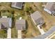 Aerial view of homes with manicured lawns, and mature trees at 10773 Sapphire Trl, Davidson, NC 28036