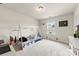 Cozy bedroom with modern decor, wall art, and a window at 10773 Sapphire Trl, Davidson, NC 28036