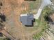 Aerial view of home featuring a driveway and surrounded by large yard with sparse vegetation at 109 Landon Ct, Shelby, NC 28152