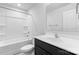 Pristine bathroom featuring a sleek vanity with a modern sink, toilet, and a bathtub with a shower at 109 Landon Ct, Shelby, NC 28152
