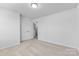 Comfortable bedroom with neutral walls, soft carpeting, and closet doors for ample storage space at 109 Landon Ct, Shelby, NC 28152