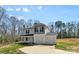Charming two-story home featuring a three-car garage, a welcoming front porch, and neutral siding at 109 Landon Ct, Shelby, NC 28152