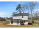 Back exterior of home with a lawn and a clear blue sky at 109 Landon Ct, Shelby, NC 28152