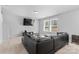 Comfortable living room with a sectional sofa, TV, and lots of natural light at 109 Landon Ct, Shelby, NC 28152